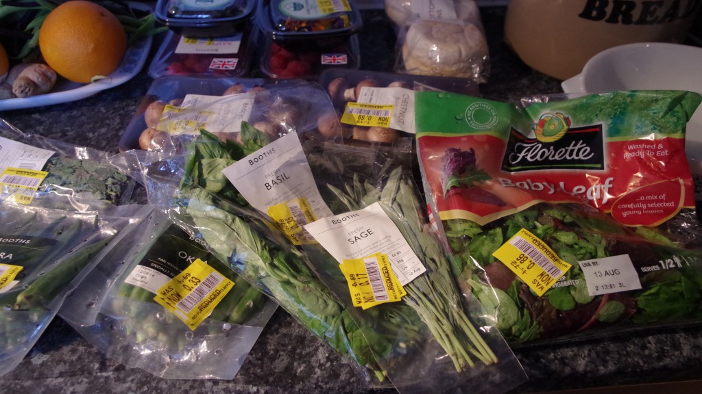 My reduced food finds included sage, basil, oregano, okra, mushrooms, raspberries and edible flowers 